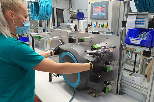 Employee subjecting a hose rewinder to the pressure test